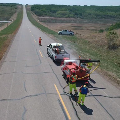 public-works-crew-fixing-cracked-roads
